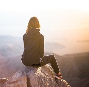 girl-watching-sun-mountain