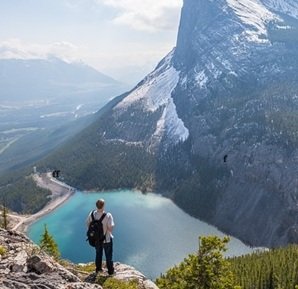 man-at-Lake-mountain-snow