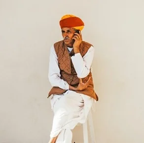 Man-talking-with-someone-562